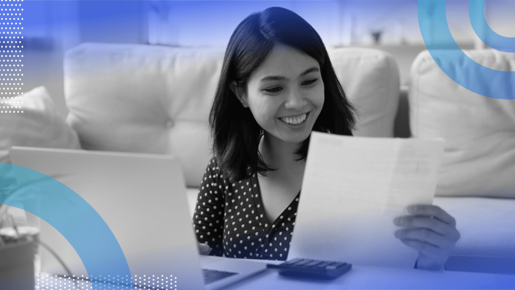 Image of a woman looking a paper.